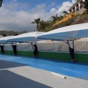 Textile and metallic parking canopies