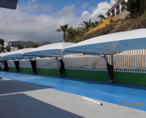 Textile and metallic parking canopies