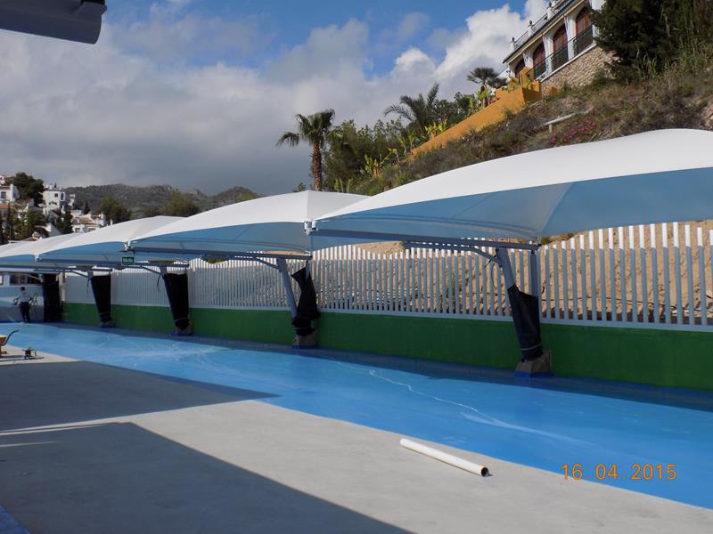 Textile and metallic parking canopies